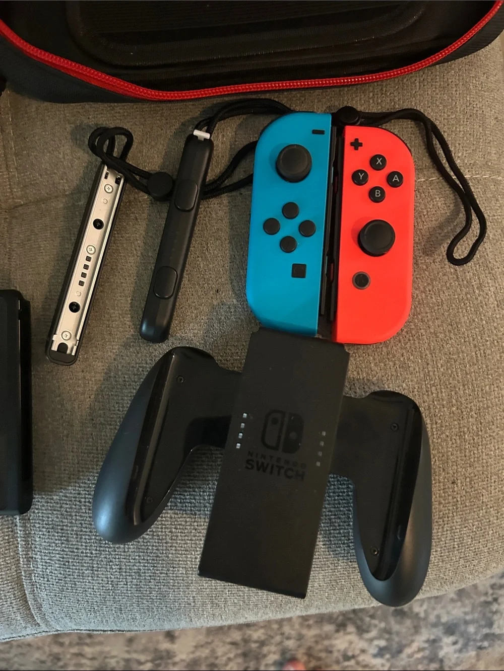 Nintendo Switch with Neon Blue & Neon Red Joy‑Con and Accessories